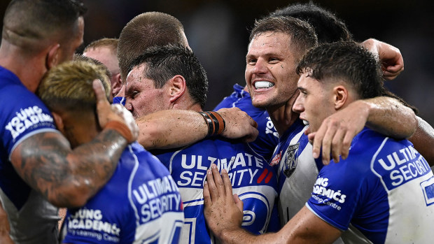 The Bulldogs celebrate after winning