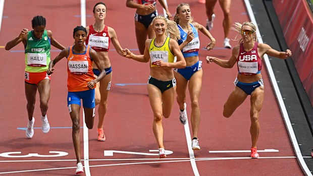 Sifan Hassan of Netherlands, second left, wins her heat in round one of the women's 1500 metres