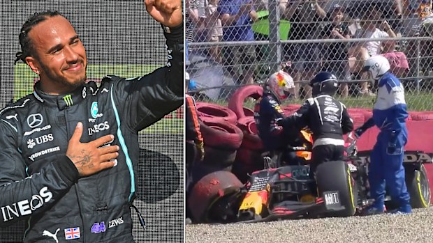 Lewis Hamilton celebrates as Max Verstappen crashes out