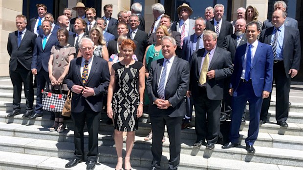 One Nation founder and leader Senator Pauline Hanson poses with 45 out of at least 55 One Nation candidates who will contest the WA state election. (AAP)