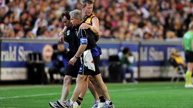 Jack Riewoldt is helped off the ground after a heavy fall in 2011