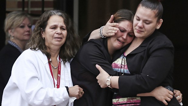 Mourners exit the church after memorial services for 5-year-old Phoebe Jonchuck at Lake Magdalene Methodist Church in Tampa, Florida. on Wednesday, January 14, 2015.