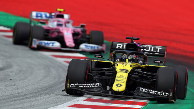Daniel Ricciardo's Renault leads Lance Stroll in the Racing Point during the Styrian Grand Prix.