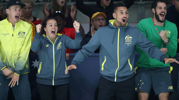Alex De Minaur and Nick Kyrgios react as John Peers and Jordan Thompson of Australia compete in a doubles match