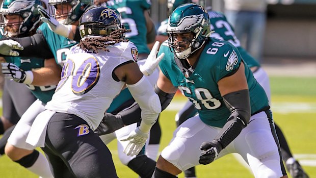 Jordan Mailata #68 of the Philadelphia Eagles blocks Pernell McPhee #90 of the Baltimore Ravens 