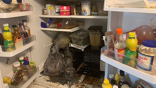 A police photo showing the contents of the fridge inside the home.