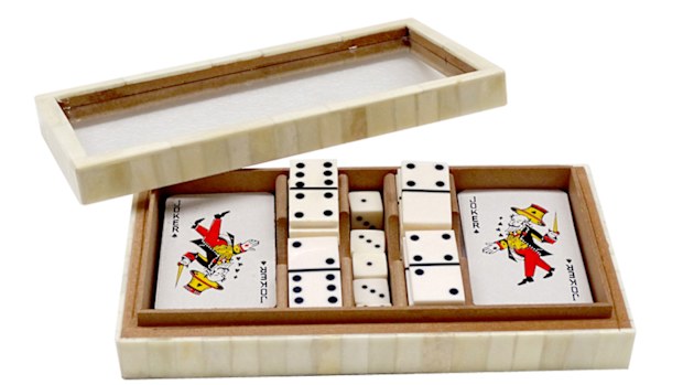 White game box with cards, dominoes and dice.