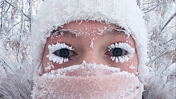 In this photo taken on Sunday, Jan. 14, 2018, Anastasia Gruzdeva poses for selfie as the Temperature dropped to about -50 degrees (-58 degrees Fahrenheit) in Yakutsk, Russia. Temperatures in the remote, diamond-rich Russian region of Yakutia have dropped to near-record lows, plunging to -67 degrees Centigrade (-88.6 degrees Fahrenheit) in some areas. (sakhalife.ru photo via AP)