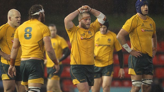 Dan Palmer stars for the Wallabies (Centre). (Getty)
