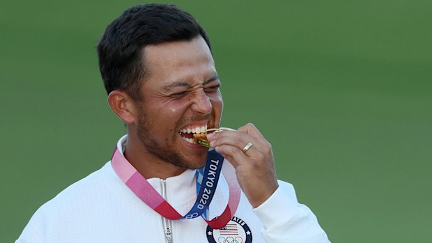 Xander Schauffele of Team United States celebrates with the gold medal during the medal ceremony after the final round of the Men's Individual Stroke Play on day nine of the Tokyo 2020 Olympic Games at Kasumigaseki Country Club on August 01, 2021 in Kawagoe, Saitama, Japan. (Photo by Mike Ehrmann/Getty Images)