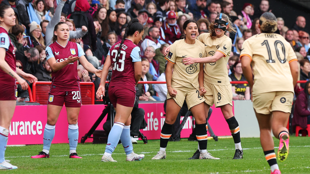Sam Kerr celebrates with teammates after scoring Chelsea FC's first goal during the Women's FA Cup semi final against Aston Villa.