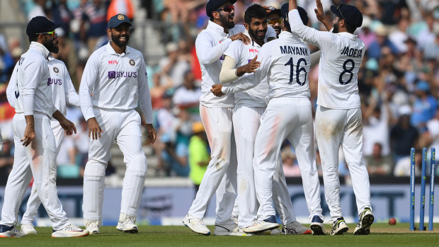 India celebrates a wicket on the final day of the fourth Test against England.