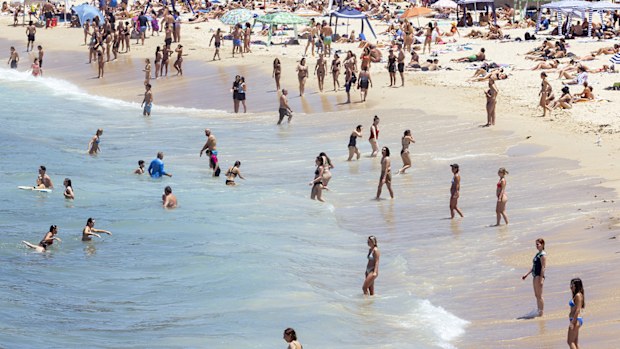 People enjoy Coogee Beach during a heatwave in Sydney on January 9, 2026. 