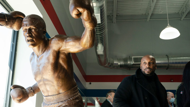 Joe Frazier Jr., looks at a statue of his father Joe Frazier, left, fighting Muhammad Ali, on the 50th anniversary of the boxers' World Heavyweight Championship boxing bout.