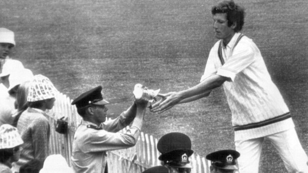England bowler Bob Willis gently hands over the fence an unconscious seagull, which cost Australian Keith Stackpole two runs at Adelaide Oval in 1971