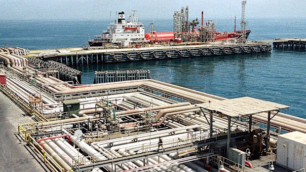 Oil pipelines snake through the port area of the Aramco facility at Ras Tannura, Saudi Arabia