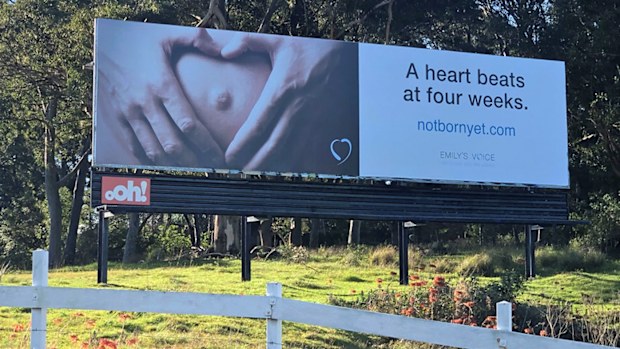 The billboard pictured beside the Pacific Highway in Belmont North, Lake Macquarie.