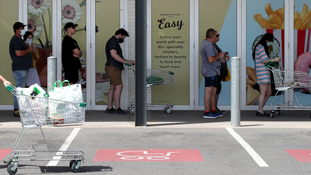 People queuing at Woolworths at West Torrens on November 18, 2020 in Adelaide, Australia after the six day lockdown was announced. 