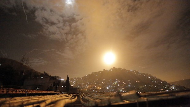 Syrian air defenses intercept Israeli missiles targeting an area in Damascus, Syria.