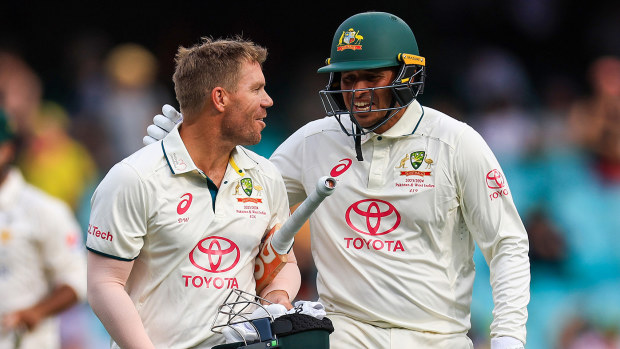 David Warner of Australia (L) and Usman Khawaja of Australia leave the field after day one of the Men's Third Test Match in the series between Australia and Pakistan at Sydney Cricket Ground on January 03, 2024 in Sydney, Australia. (Photo by Mark Evans/Getty Images)