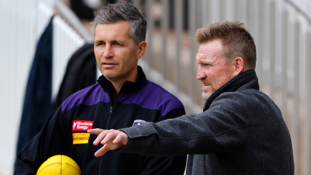 Justin Longmuir and Nathan Buckley during a Dockers training session in April.