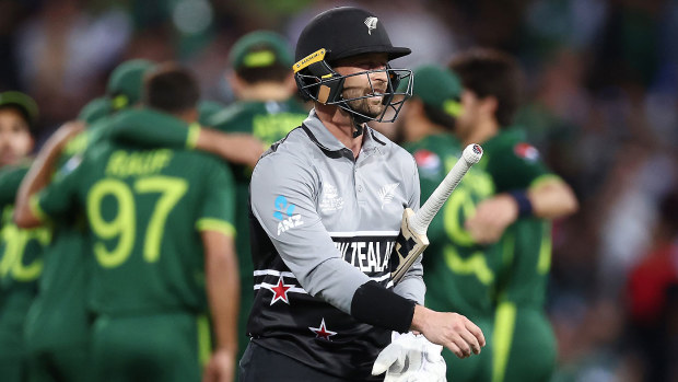 Devon Conway walks off the ground after being run out in the T20 World Cup semi-final against Pakistan