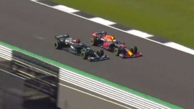 Lewis Hamilton draws alongside Max Verstappen moments before their British Grand Prix crash.
