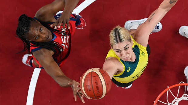 Cayla George #15 of Team Australia goes up for a shot against Sylvia Fowles #13 of Team United States.