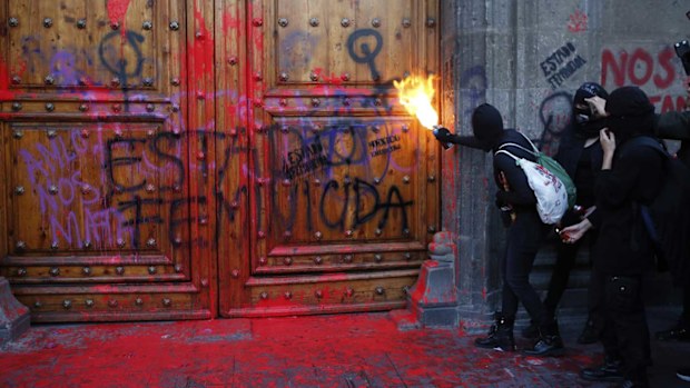 Demonstrators demand an end to gender violence in Mexico.