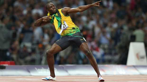 Jamaican sprinting legend Usain Bolt pulling off his signature move.