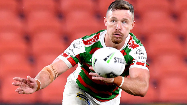 Damien Cook of the Rabbitohs passes the ball during round 2