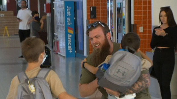 Families reunited at Perth Airport as WA border reopens