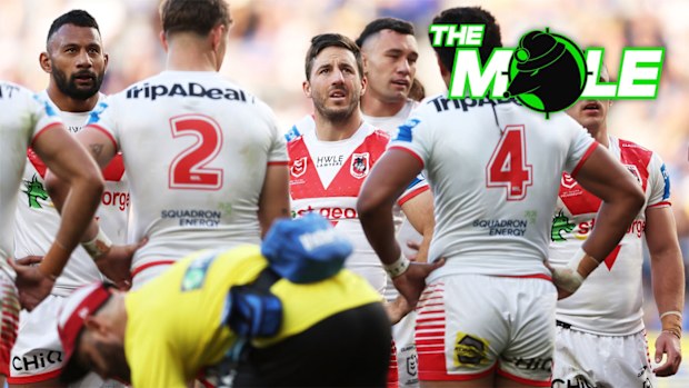 St George Illawarra Dragons players, including Ben Hunt, react after conceding a try.