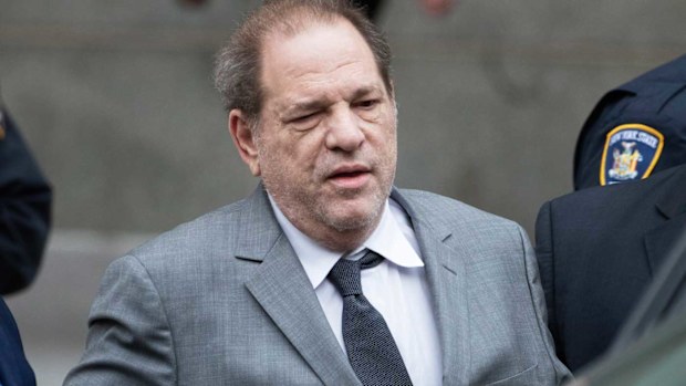 Harvey Weinstein, center, leaves court following a bail hearing, Friday, December 6, 2019 in New York.