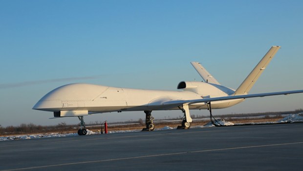 China's new unmanned, armed reconnaissance drone the WJ-700 has successfully completed its maiden flight.