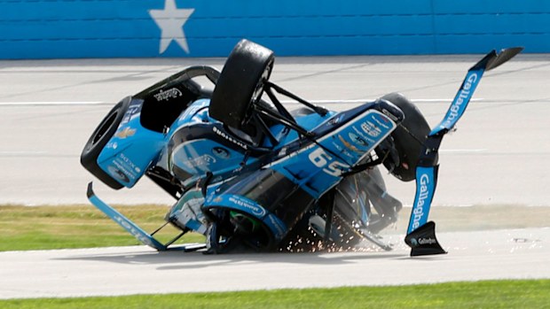 Conor Daly flips over during the NTT IndyCar Series XPEL 375 at Texas Motor Speedway.
