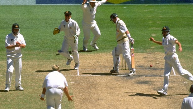 Shane Warne celebrates the wicket of Daryll Cullinan at the MCG in 1997-98.