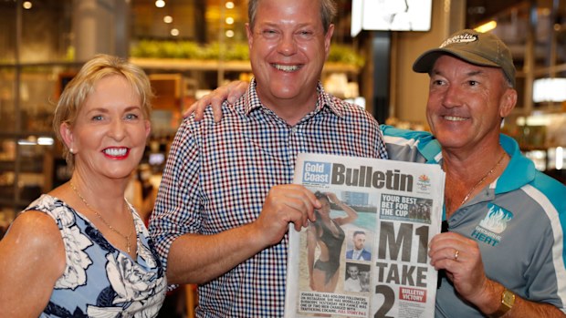  Queensland LNP leader Tim Nicholls (centre) along with Ros Bates (left) member for Mudgeeraba meets with local resident Chris Lebreton from Carrara during a visit to The Kitchens at Robina Town Centre during his Queensland election campaign (AAP Image/Regi Varghese)
