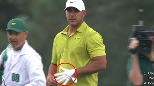 Brooks Koepka was questioned by the Masters committee after footage showed him appearing to signal the number five as he removed his glove