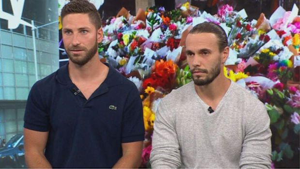 Damien Guérot and Silas Despreaux (L-R) Bondi Junction Westfield bollard man hero