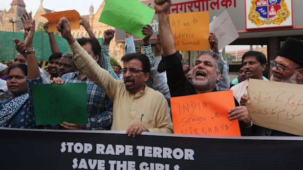 Activists shout slogans demanding justice in the case of a veterinarian who was gang-raped and killed last week during a protest in Mumbai, India, Monday, Dec. 2, 2019.