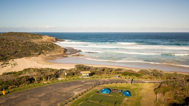 Despite the best efforts of surf lifesavers and other emergency service responders, a 55-year-old man died and his 20-year-old son is in hospital after getting into difficulty in a rip at Frazer Park Beach on the NSW Central Coast.