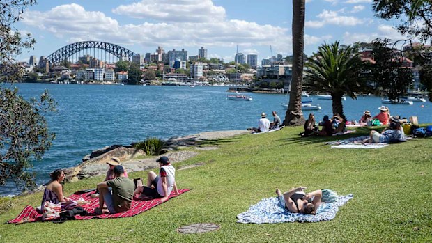 Picnickers gather at Cremorne Point in Sydney on the October long weekend.