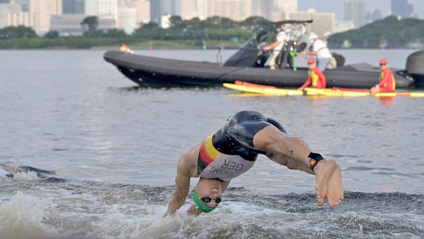 A TV boat is seen at the triathlon