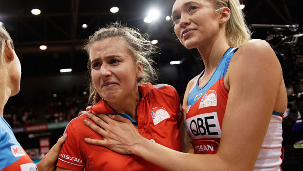 Injured Captain Maddy Proud and Helen Housby show emotion after the Super Netball Preliminary Final between the NSW Swifts and the Melbourne Vixens