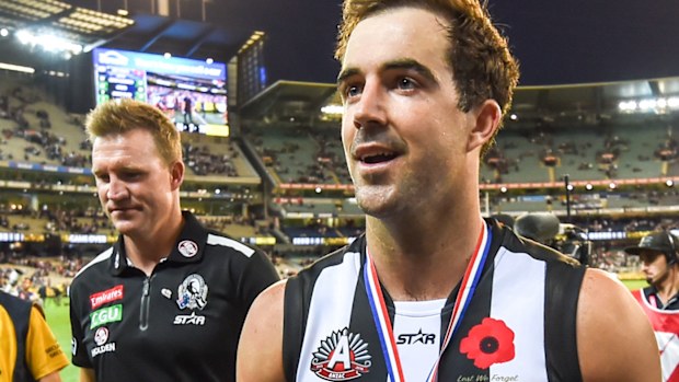 Steele Sidebottom and coach Nathan Buckley 