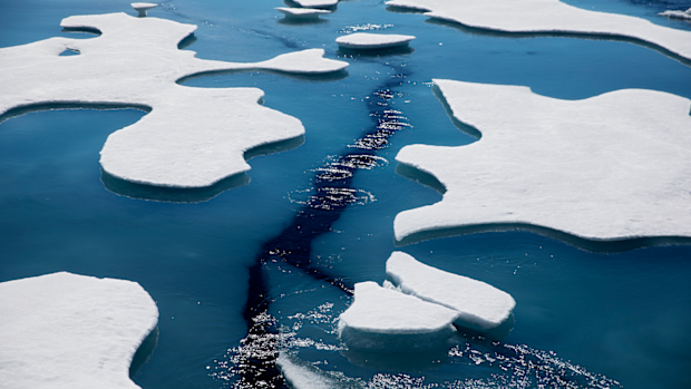 Sea ice breaks apart as the Finnish icebreaker MSV Nordica traverses the Northwest Passage through the Victoria Strait in the Canadian Arctic Archipelago Friday, July 21, 2017. (AP Photo/David Goldman)