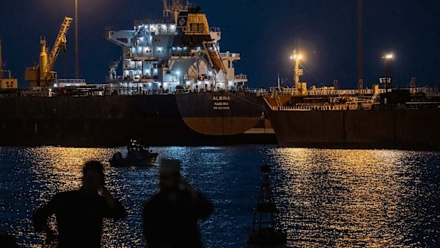 Unable to pass through the Strait of Hormuz, ships are anchored in Oman.