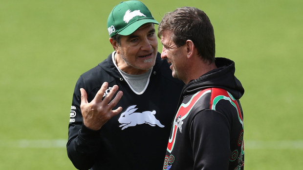 Fenech chats with Souths coach Jason Demetriou at a training session earlier this year