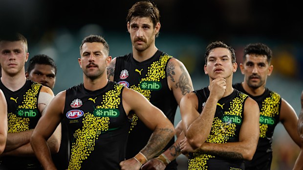 Jack Graham, Sam Naismith and Daniel Rioli of the Tigers look on during the 2024 AFL Round 07 match between the Richmond Tigers and the Melbourne Demons at the Melbourne Cricket Ground on April 24, 2024 in Melbourne, Australia. (Photo by Dylan Burns/AFL Photos via Getty Images)